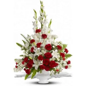 Ir al producto: Centro funerario de claveles rosas liliums y gladiolos