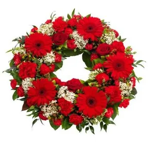 Ir al producto: Corona de gerberas rosas y claveles
