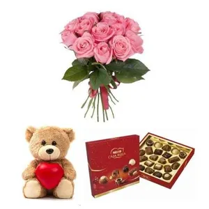 Ir al producto: Ramo de 10 rosas rosadas con bombones y osito de peluche