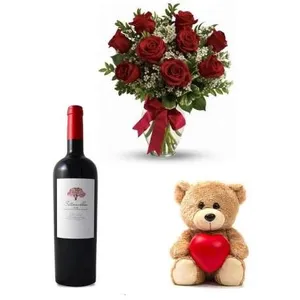 Ir al producto: Ramo de 10 rosas rojas con vino y osito de peluche