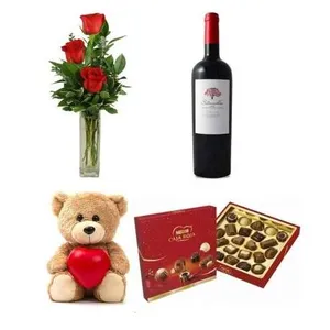 Ir al producto: 3 rosas rojas con osito vino y bombones