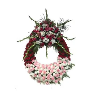 Ir al producto: Corona de claveles rosas y margaritas